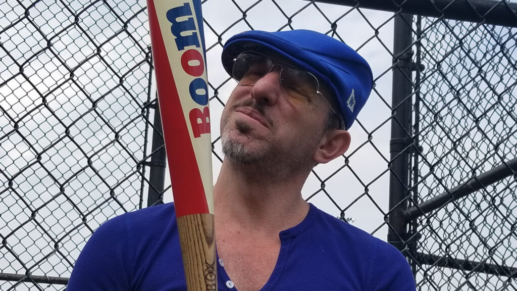 Artist Matthew Rosen with the Boom Stick baseball bat.